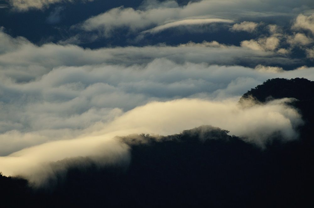 clouds through mountains
